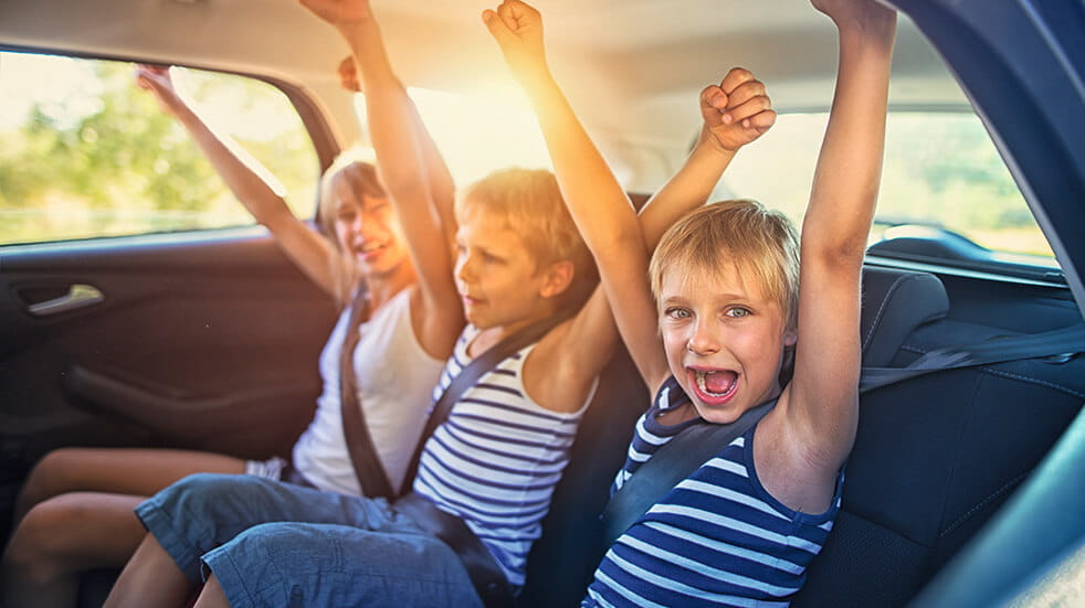 10 reasons to take a family road trip across America children in car